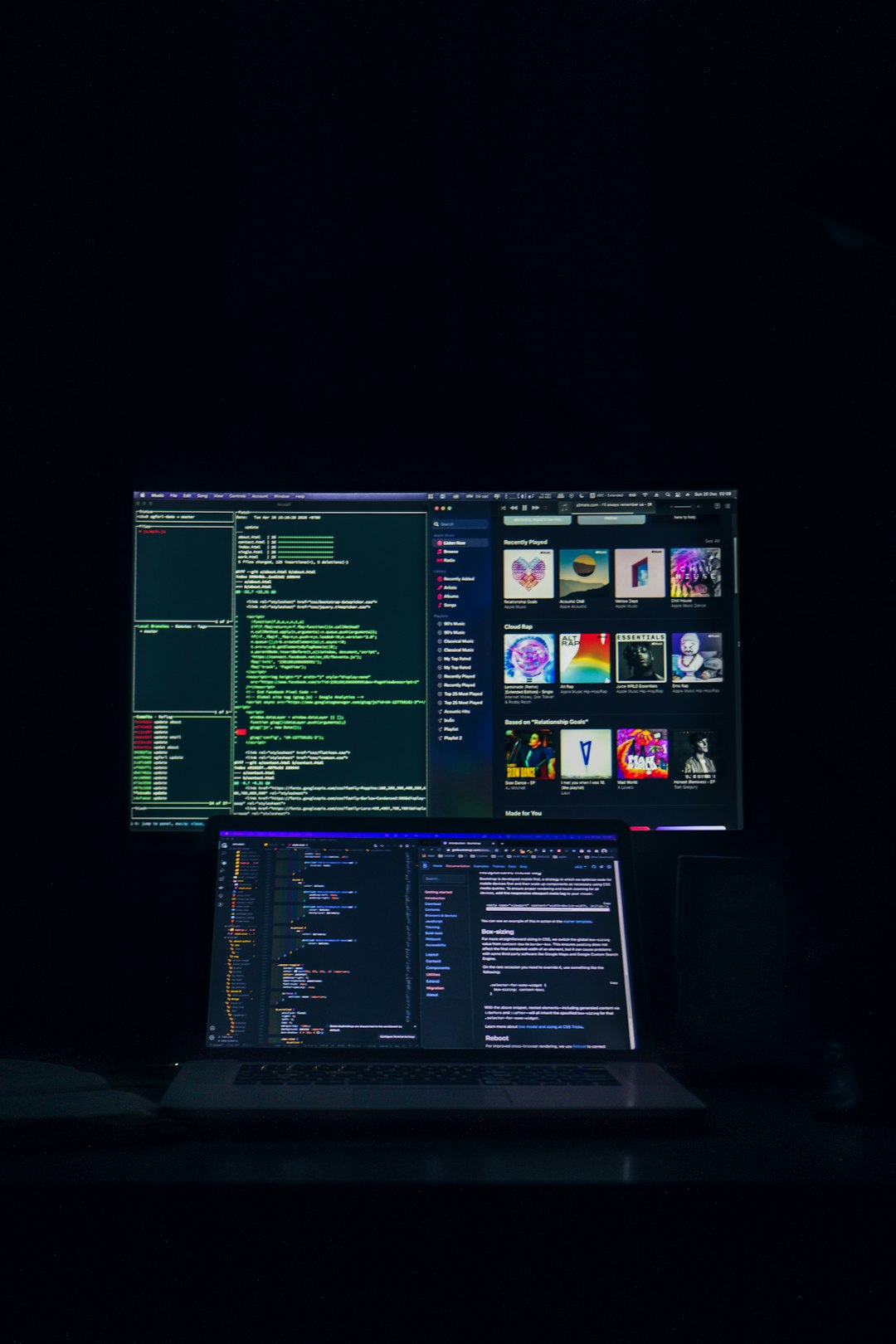 a-laptop-computer-sitting-on-top-of-a-desk-uecmwycmyg8